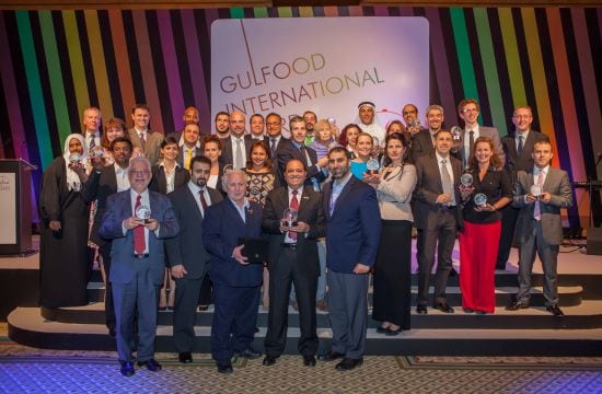 Award winner for best new frozen or chilled food: Midamar Corporation – Oven Roasted Turkey Breast. Yahya, Bill and Jalel Aossey in the front row with their local agent holding the Gulfood Award. 