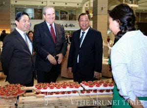 Minister of Energy and Industry at the Prime Minister's Office YB Pehin Dato Hj Mohd Yasmin (2nd R), Deputy Minister of Finance Dato Dr Hj Amin Liew Abdullah (L), British High Commissioner to Brunei David Campbell (2nd L) tour the bruneihalal showcase during the launch of 25 bruneihalal products at The Airport Mall. BT/Zaim Kasmat