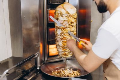 meat being sliced